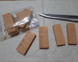 Foto del paso 1 de la receta: Obleas rellenas con baño de chocolate