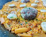 Foto del paso 7 de la receta: Arroz con figatells, blanquets y ajos tiernos