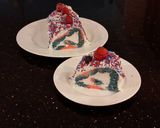 A picture of step 29 of Patriotic Vanilla Cake Roll with Whipped White Chocolate Ganache Filling and Frosting.
