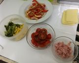 Foto del paso 5 de la receta Pizzetas individuales con gustos
