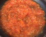 A picture of step 4 of Greek Strapatsada Eggs.