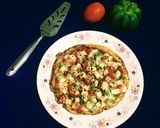 A picture of step 14 of Pan Paneer Pizza.