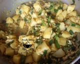 A picture of step 12 of Potato soup with orange zest rice.