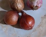 A picture of step 1 of White wine vinegar onion.