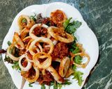 A picture of step 3 of Calamari Rings with Spiced Breadcrumbs and Arugula.