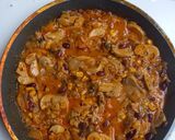 A picture of step 3 of Hungarian Mushroom Paprikash with rice, wild rice, corn and red beans.