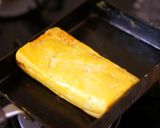 A picture of step 8 of Fluffy Japanese Rolled Omelet with Shirodashi.