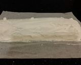A picture of step 25 of Chocolate Strawberry Ice Cream Cake Roll.