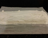 A picture of step 25 of Chocolate Strawberry Ice Cream Cake Roll.