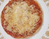 A picture of step 4 of Naan pizza.