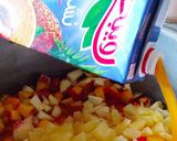 صورة لخطوة 7 من وصفة سلطة فواكه مشكلة 🍌🍋🍍🍏