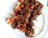 A picture of step 6 of Tsire Skewers.