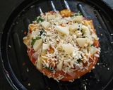 A picture of step 9 of Paneer Naan Pizza.