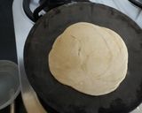 A picture of step 21 of Matar paneer with lacha pratha.