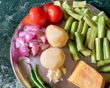 A picture of step 1 of Sajna Phalli/Drumsticks Light Subji.
