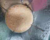 A picture of step 2 of Pomegranate orange juice.