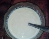 A picture of step 35 of Aloo fulcopi katla rosha ar misti doi.