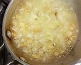 A picture of step 4 of Cheesey Spicy Garlic Potato.