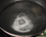 A picture of step 1 of Garlic Butter corn Spaghetti.