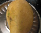 A picture of step 1 of Mango Shake with ice cream.