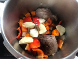 Carrilleras de cerdo con salsa de pimientos y oporto