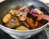A picture of step 12 of Eggplant Potato Curry with Fennel.