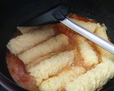 A picture of step 4 of Tomato tofu ring roll.