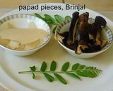 A picture of step 1 of Vaththal kuzhambu with brinjal and sundaikkai vaththals.