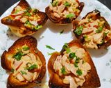 A picture of step 6 of Creamy corn in bread baskets.