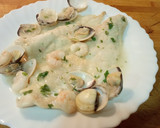 Foto del paso 7 de la receta: Merluza con almejas y gambas estilo marinera
