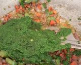 A picture of step 4 of Double tadka lahsuni Palak khichdi.