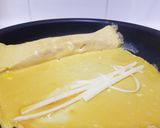 Une image de l'étape 12 de Tamagoyaki (omelette japonaise sucrée).