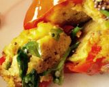 A picture of step 7 of Dhokla Stuffed red capsicum.