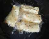 A picture of step 9 of Crispy raw banana roll.