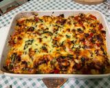 A picture of step 23 of Endive Gratin with Red Bell Peppers, Ham, Honey, and Curry.