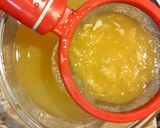 A picture of step 1 of Orange Jelly Pudding Layer in a Glass.