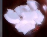 A picture of step 1 of Shredded coconut candy.