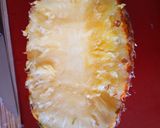 A picture of step 3 of Edible fruit arrangement on a pineapple boat.