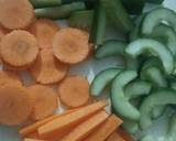 Pickled cucumber & carrot accompanied with freshgreen & red chillies recipe step 1 photo