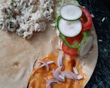 A picture of step 5 of Tortilla Wrap with egg and veggies.