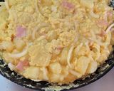 Foto del paso 4 de la receta: Tortilla de papa con jamón y cebolla