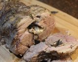 A picture of step 6 of Hearb roasted leg of lamb roll with potatoes and carrots.
