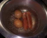 A picture of step 1 of Eggs, smokies with kachumbari.