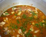 A picture of step 13 of Aalu chicken ka salan.