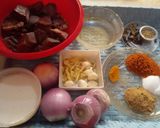 A picture of step 1 of Kaleji Masala with Naan.