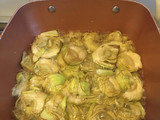 Alcachofas con panceta y huevo frito