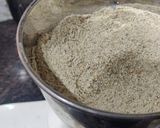 A picture of step 2 of Rajasthani Bajra Khichda (pearl millet).