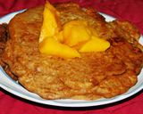 A picture of step 4 of Oats & Walnut Pancakes with Mango-Cashew Cream.