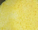 A picture of step 5 of Easy Butter Turmeric Rice in a Rice Cooker.
