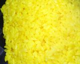 A picture of step 6 of Easy Butter Turmeric Rice in a Rice Cooker.